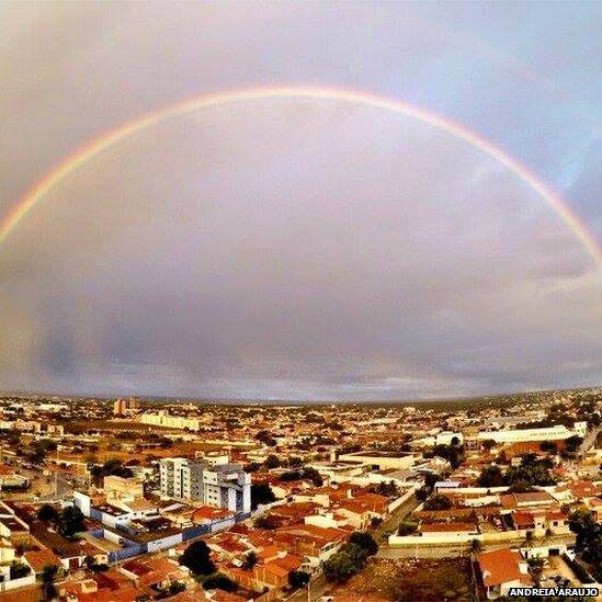 Rainbow over city