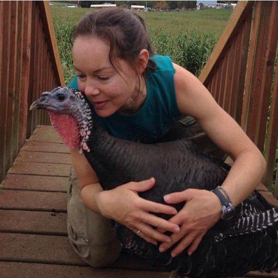 Jodie with her ESA, Easter the turkey