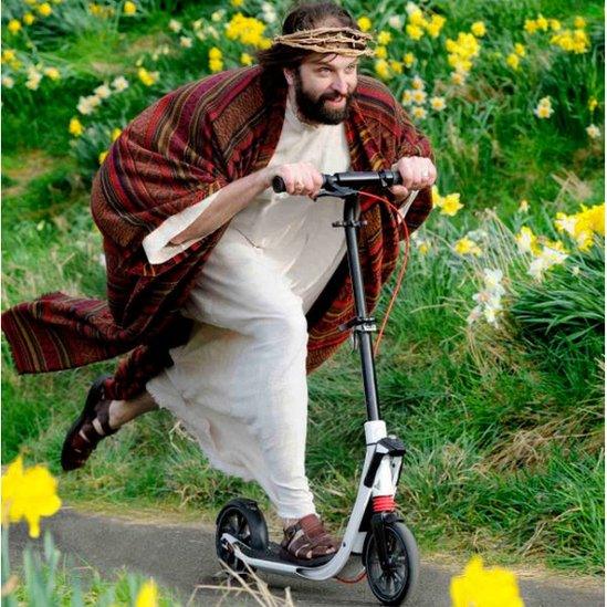 Jesus on a scooter