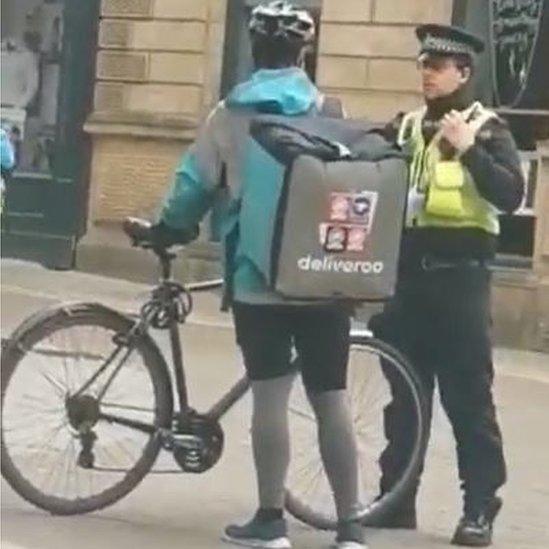 Cyclist getting fined