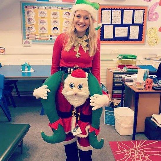 Alison Gray wearing Santa-piggyback fancy dress