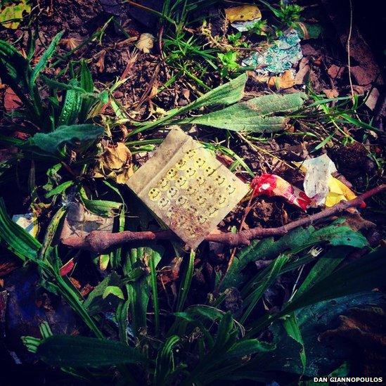 Smiley face bag on the ground