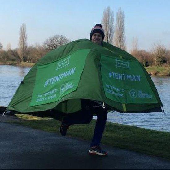 Man dressed as a tent