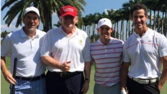 President Trump (2nd left) with Rory McIlroy (2nd right) on Sunday