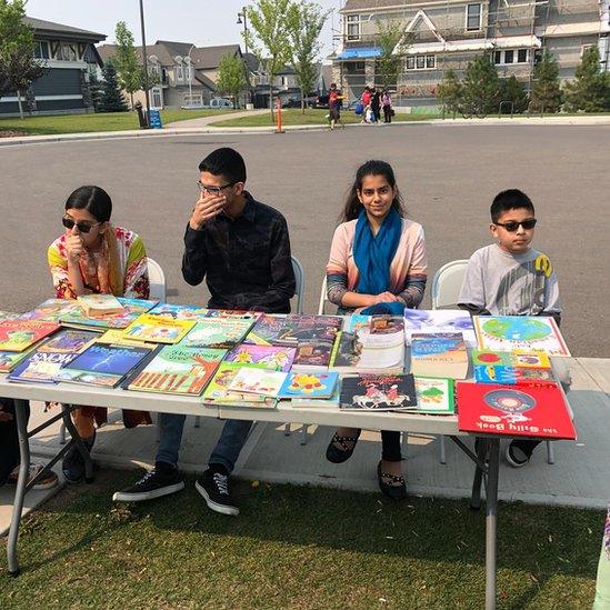 Punjabi and Urdu books sit alongside Canadian classics like Anne of Green Gables