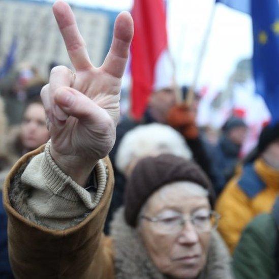 Protesters attend a "Free Media" demonstration in front of the Polish Television in Warsaw