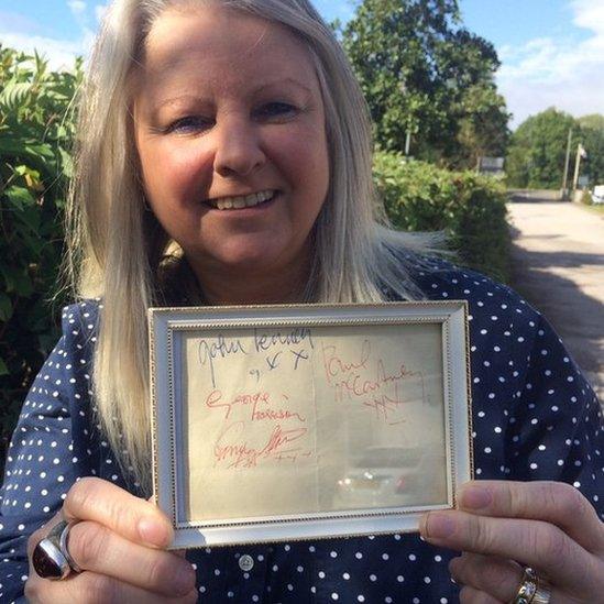 Beatles signatures in a picture frame