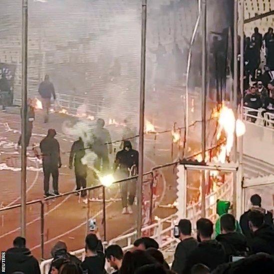 Fans with flares in the stadium