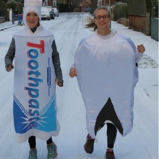 Running duo dressed as toothpaste and tooth