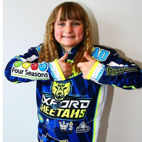 Chloe with her speedway outfit