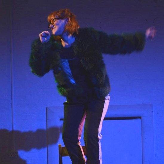 Charlotte performing in her self written play Rocket Woman