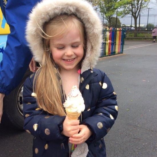 Child eating icecream.