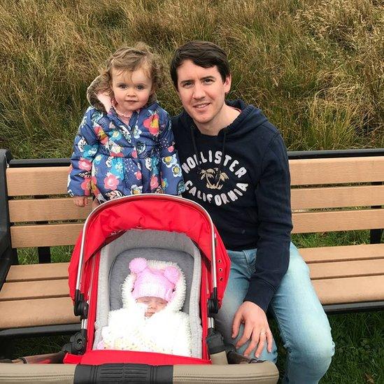 Mark Griffin with his two daughters