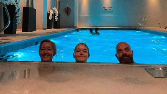 Aby, Beth and Ben in a swimming pool