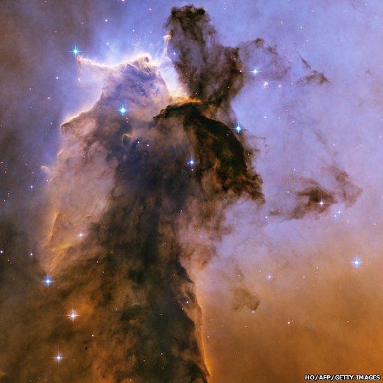 Hubble Space Telescope image - towers of gas and dust rising from a stellar nursery called the Eagle Nebula