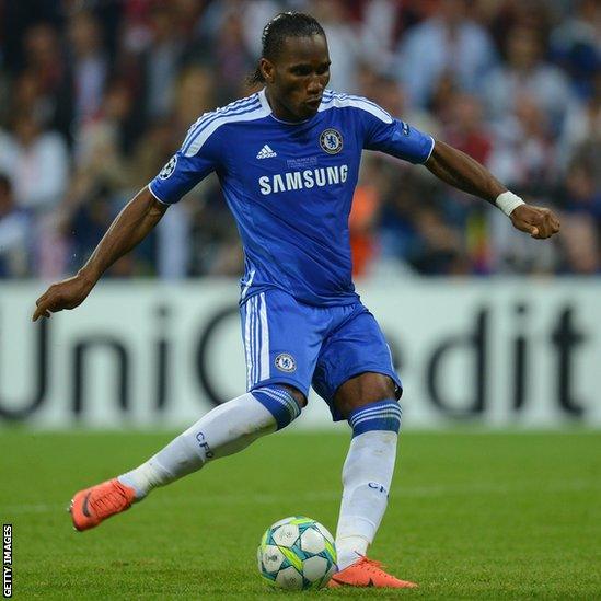 Didier Drogba scores the final penalty