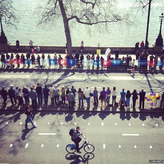 Waiting for the marathon runner by Somerset House. Photo: lomokev