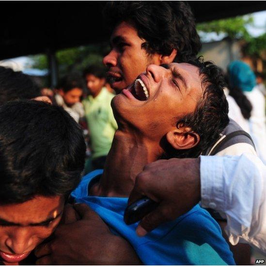 A man grieves at the site of the collapse, Dhaka (25 April 2013)