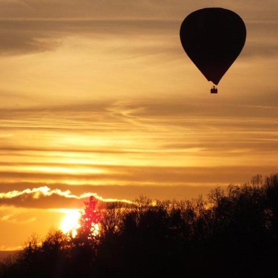 Balloon at sunset