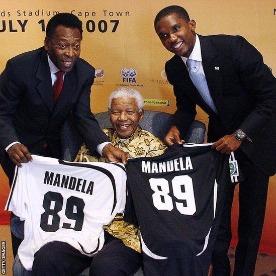 Nelson Mandela with Pele and Samuel Eto'o