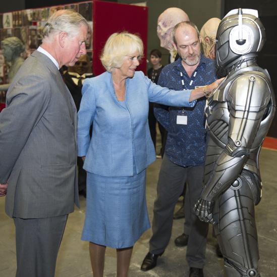 The Duchess of Cornwall and the Prince of Wales with a Cyberman