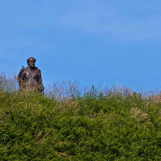 Alun Jones of Llanbadarn Fawr said he met this statue of St Caranog walking towards him through the grass as he walked the coastal path in Ceredigion