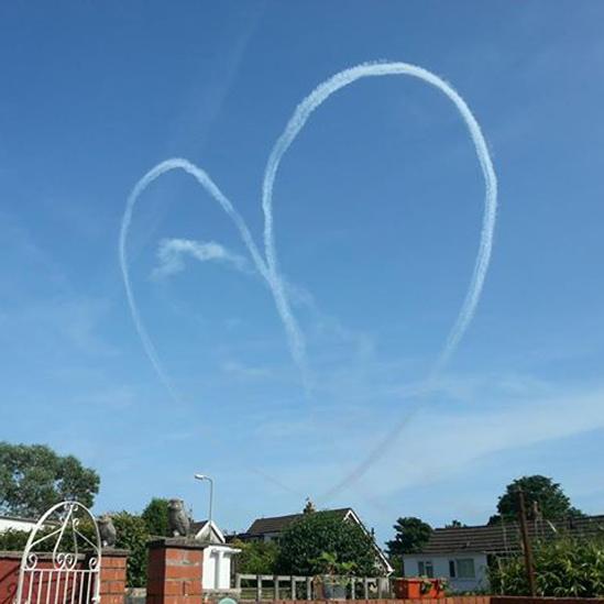 Heart-shaped vapour trail over Swansea