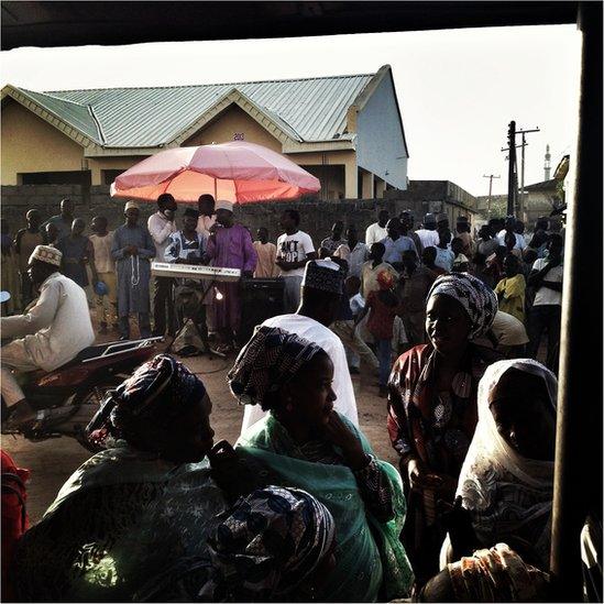 Guest mill around at a Nigerian wedding