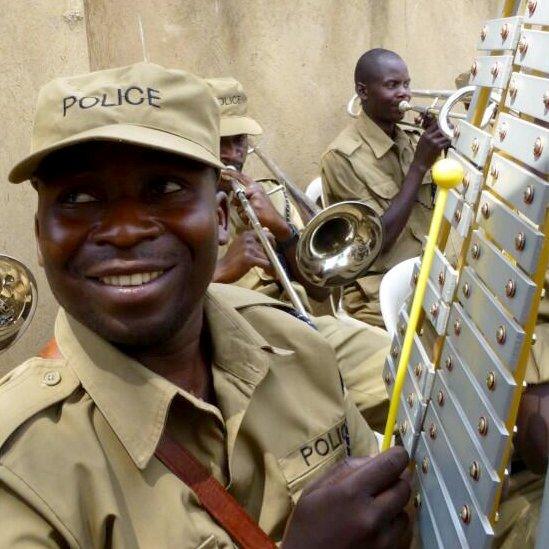 The local police band welcomes the baton in great style in the Ugandan capital, Kampala.