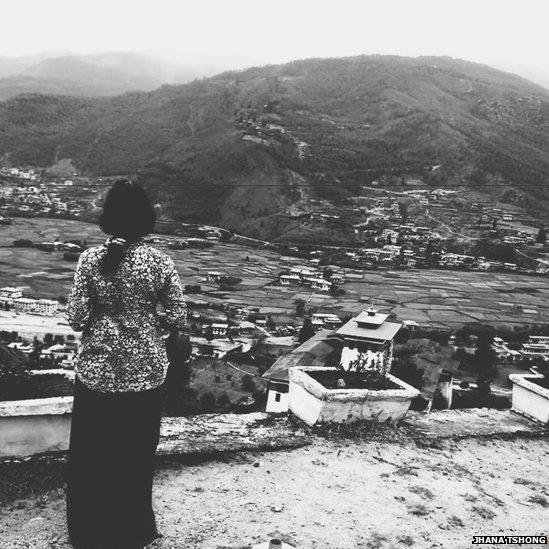 Woman overlooking valley