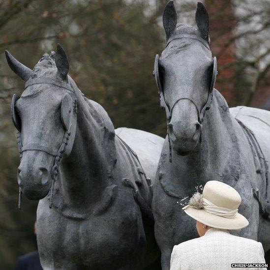 The Queen, Prince Philip and Prince William with the life-sized horse sculpture in Windsor