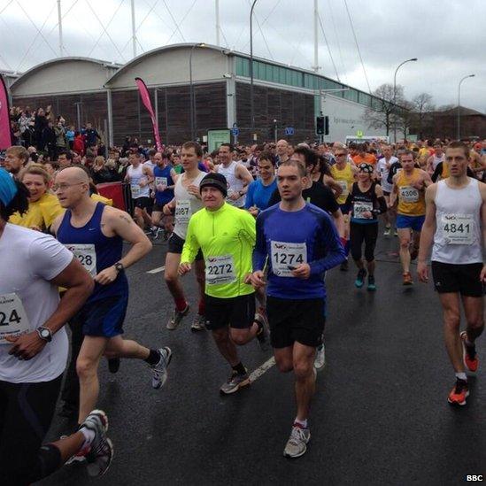 Runners at Sheffield Half Marathon start line.