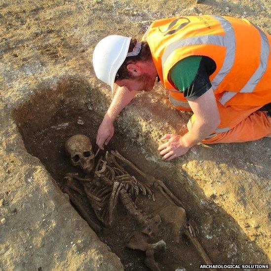 Skeleton being excavated in Exning