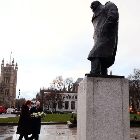 Winston Churchill's great-grandson and granddaughter lay a wreath