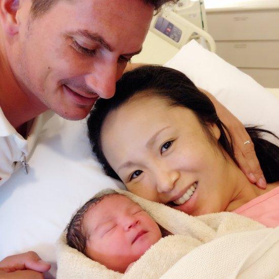 Mariko Oi with her husband Skye Neal and their baby daughter Miku Rose