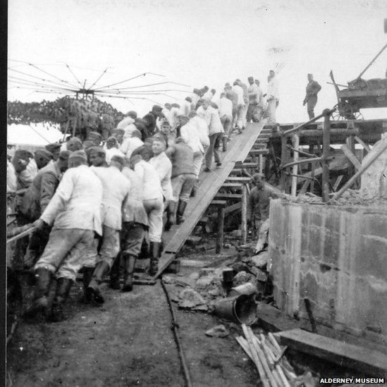 Troops installing a gun implacement