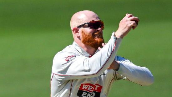 Lloyd Pope prepares to bowl