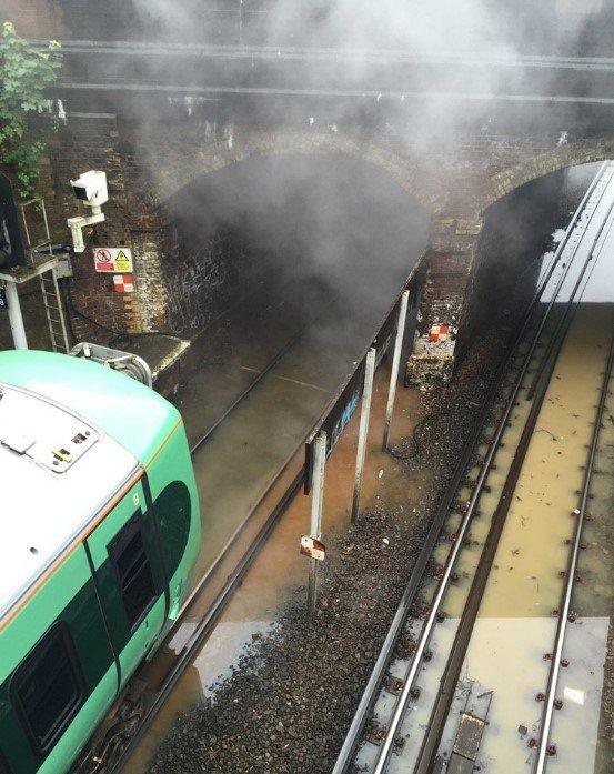 Smoke coming off flooded line in Norwood Junction