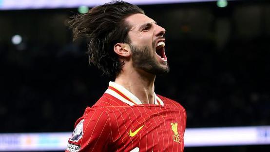 Liverpool's Dominik Szoboszlai celebrates scoring their third goal at Tottenham