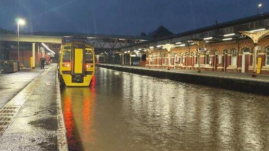 A flooded railway station