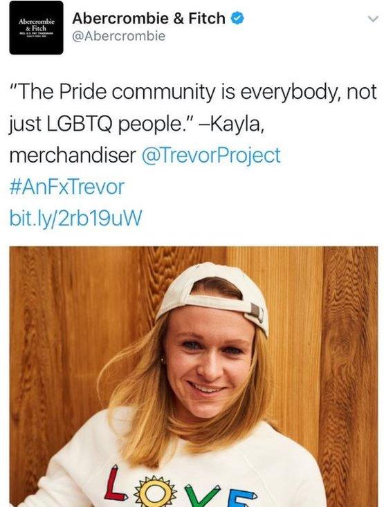 Abercrombie and Fitch tweeted a picture of an employee in a T-Shirt reading "Love", and the words, "The Pride community is everybody, not just LGBTQ people. - Kayla, merchandiser."