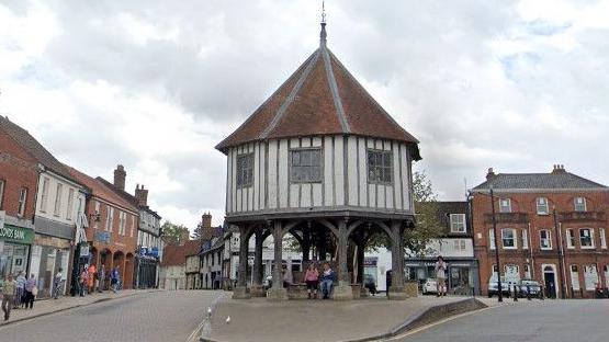 Market Cross, Wymondham is a timber-framed structure - an octagonal building supported over an open ground floor by eight timber buttress-like posts and a middle post 