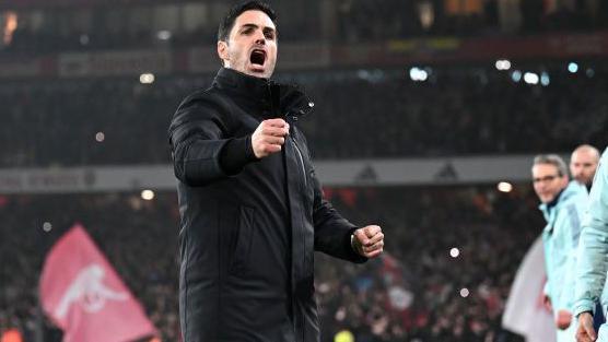 Arsenal manager Mikel Arteta celebrates at the end of the win against Tottenham