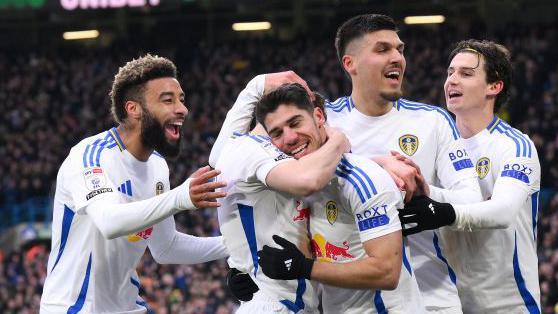 Leeds players celebrating a goal v Cardiff City