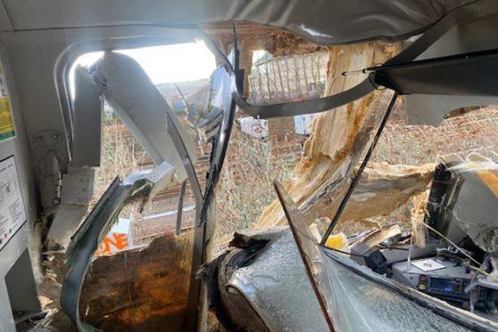 The badly-damaged interior of a train cabin caused by hitting a fallen tree at high-speed