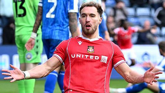 Wrexham striker Sam Smith celebrates