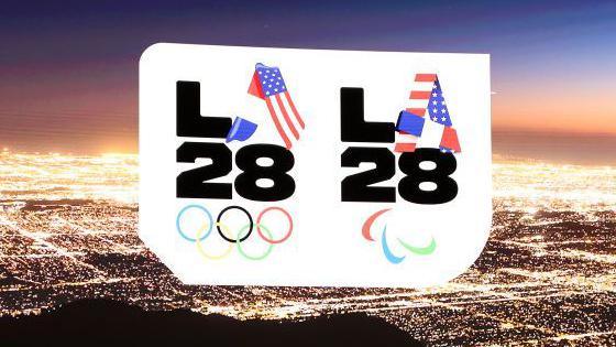 An LA28 presentation and meeting show images of Los Angeles and logos for the 2028 Olympics and Paralympics