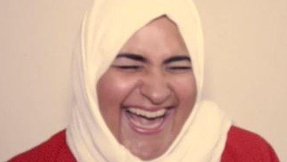 Saudi woman laughing