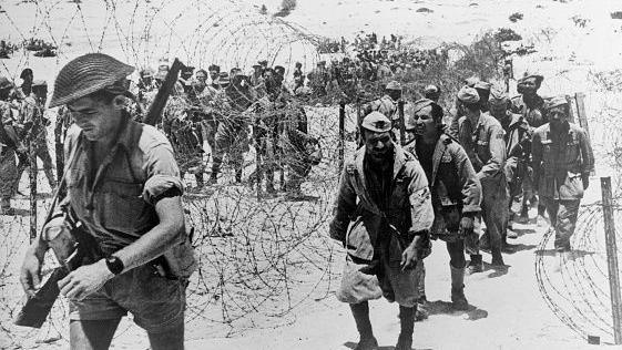 Italian prisoners being marched across the desert after the Battle of El Alamein. 