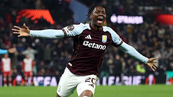 Jamaldeen Jimoh-Aloba celebrates scoring for Aston Villa. 